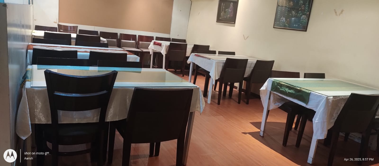 Neatly laid out dining tables ready for guests